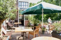 Hotel Station Amstelveen Hotel dekat Clara Maria Cheese & Clog Farm
