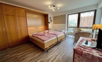 Apart Hotel Goldener Hahn Baiersbronn, Ferienwohnungen | Frühstück, Sauna & Indoorpool