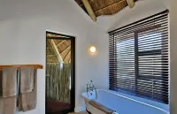 Warthogs Bush Lodge - balcony