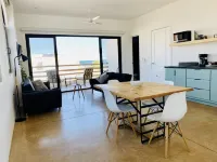 Apartment with mountain view, private balcony and access to beach front terrace.