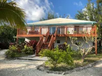 Large 4 Bed/4Bath Beachfront Apartment Sleeps 8 and Directly  on Hoopers Bay Hotel a 
