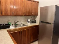 A colored beacon sitting on the hill side road that leads into Sandy Ground, Hotels in Sandy Ground