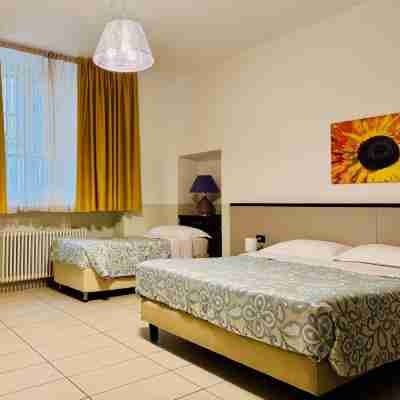 Hotel Marco's Rooms