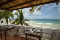 Casita de la Playa Hôtels à : Puerto Villamil
