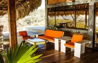 Hush Maderas Hotels in Tola