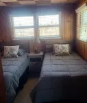 Charming 2-bedroom cottage with WiFi, AC on a peaceful Harsens Island canal.