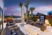 Steps to BeachShops Oceanview Hot TubFirepit Moonlight Modern by AvantStay