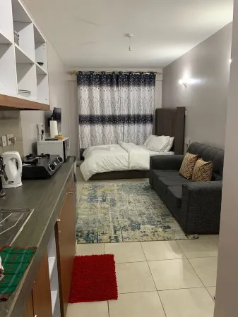 Modern Studio Apartment With a Swimming Pool - Cosy Suites B&B Nairobi Отели в г. Киамбу