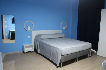 Orchidea - Quadruple Room - B&B Lasso Отели рядом с достопримечательностью «Castello Ducale»