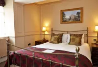 Lamb Hotel by Greene King Inns Hotels near Vision Express Opticians at Tesco - Ely