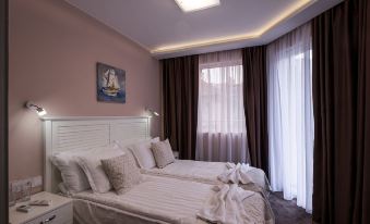 Caro Apartments & Rooms
