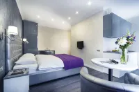 Hotel Status Apartments