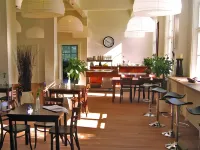Guesthouse Eleven Hotel - Frühstück