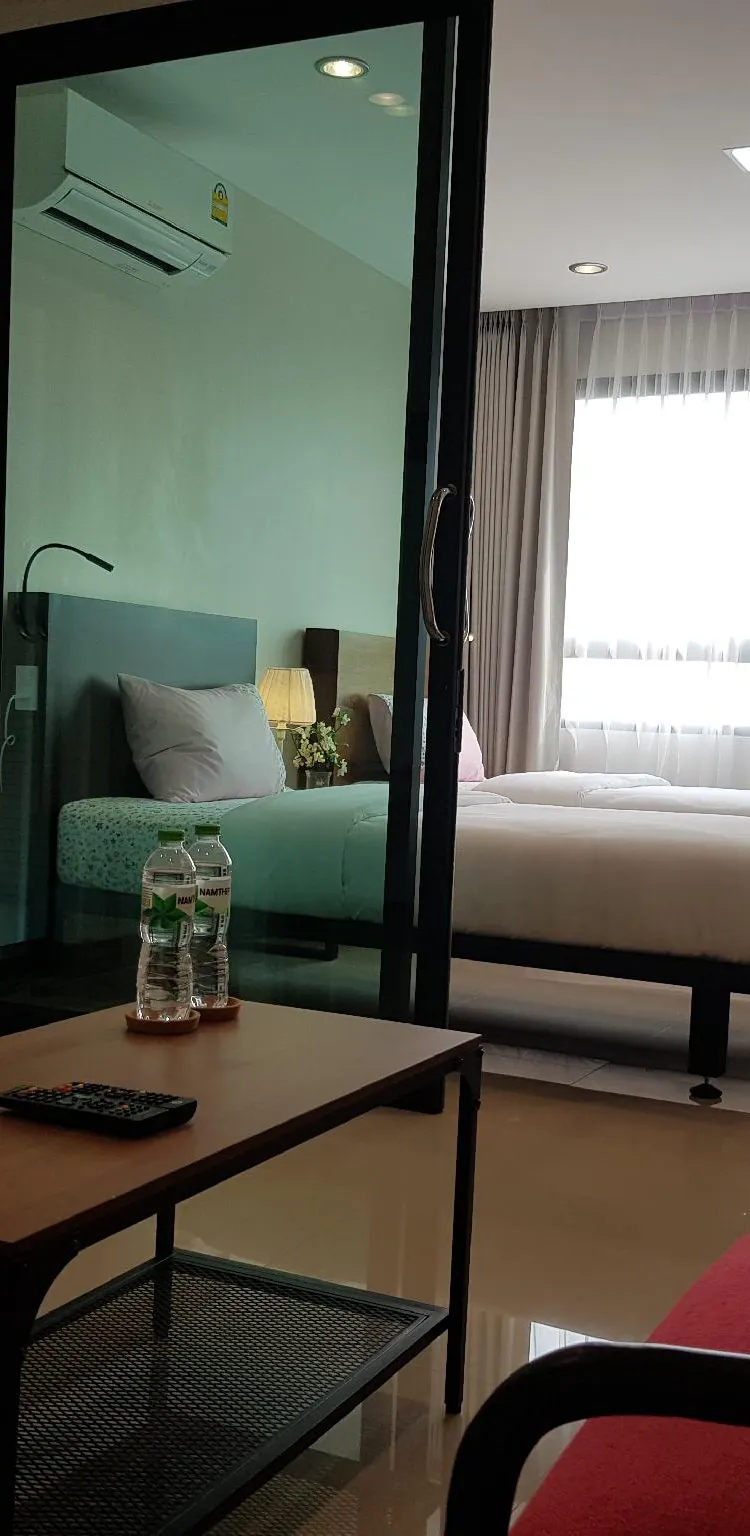 ห้องมาตรฐานเตียงแฝดพร้อมวิวสวนหย่อม