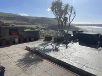 Large Victorian House for 12 Overlooking Woolacombe Beach. Hot Tub, BBQ, Parking Hotels in Woolacombe