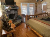 Ms Natalie Cabin on the Lake with Water Trampoline Hotels near 5th Ave. Consignment Boutique