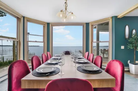 6BR Houghton Lake House w/ Indoor Pool, Hot Tub, and Golf Simulator - Sleeps 24