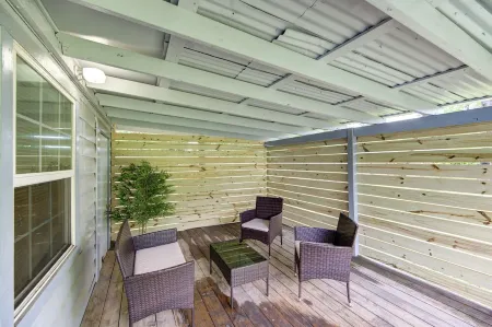 Indoor fireplace with patio and pool table
