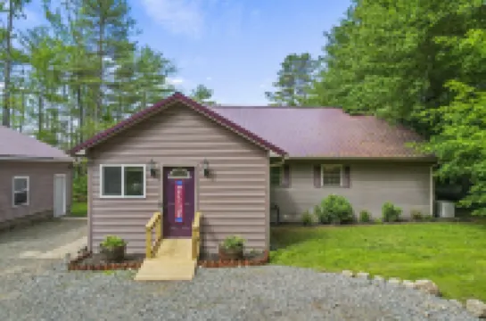 Quiet lake front home with private beach