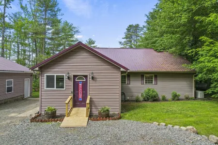 Quiet lake front home with private beach