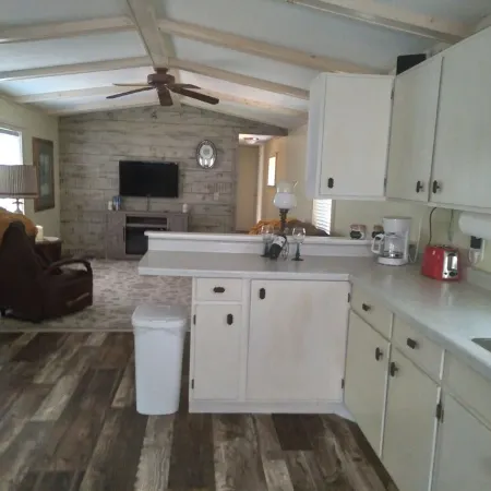 Cozy nestled in quiet neighborhood. On snowmobile and ATV trail.