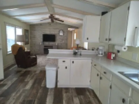 Cozy nestled in quiet neighborhood. On snowmobile and ATV trail.