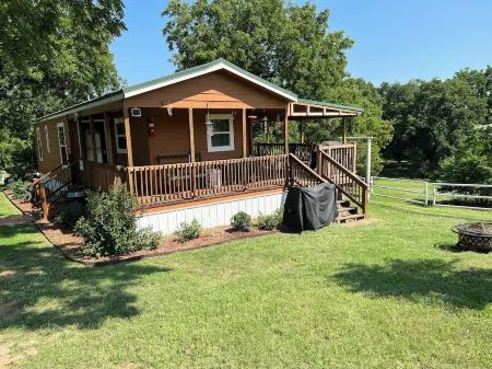 Ben Ranch Cabin # 2 located in a century old Pecan Orchard. 2 Bedroom plus couch