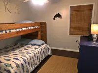 Charming Cottage Snuggled in Main Lake Cove with Perfect Location and Views