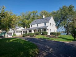 Lake Front 2.20 acre estate  Private boat launch with pier