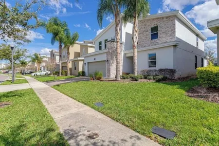 Luxe 6BR Villa w/Theater, Game Room&Private Pool! Отели рядом с достопримечательностью «ChampionsGate Golf Resort»