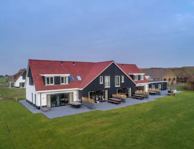 Modern Villa in de Cocksdorp Near the Beach Hotels near Klimmen EnZo