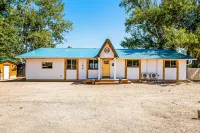 Single-level, lakefront getaway with mini-bar, furnished deck & mountain views