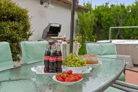 Charming Retreat with Hot Tub and Garden Dining - Spacious Coastal Haven