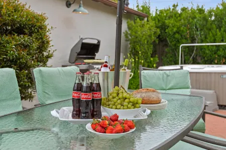 Charming Retreat with Hot Tub and Garden Dining - Spacious Coastal Haven