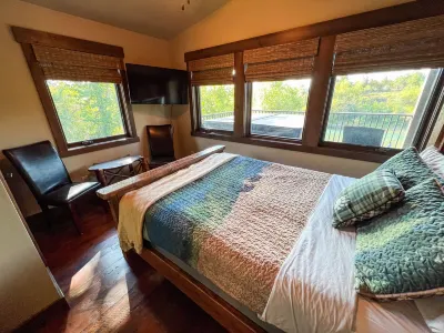 New AC! Riverfront Townhome, 3 bed 2 full/2 half bath, Hot Tub, Private Dock and Fire Pits Hotels near Whitefish Farmers' Market