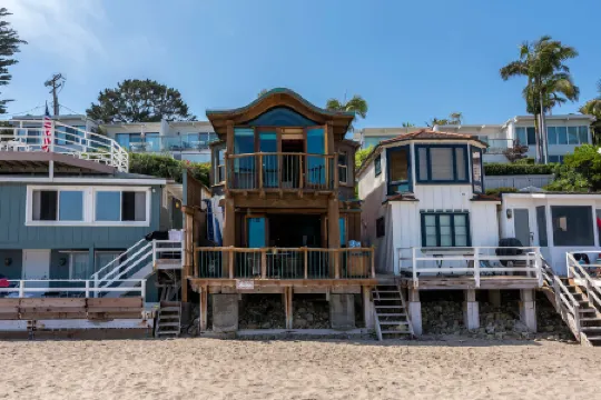 Unique Beachfront Home with Stunning Views - Charming Coastal Haven