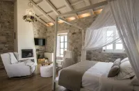Bassa Maina Villas & Suites Hotel di 