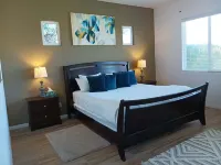 Charming 2-bedroom house with AC, in country club palms with a view of Golf C..