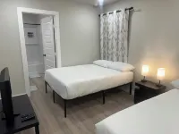 New Charming 3-bedroom home each w/TVs, 6 Beds, 2 Full Bath, Corner lot parking.