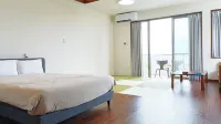 Kariyushi Condominium Resort Sea Side House Hotels in Nago