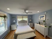 Hot Tub, Putting Green, 5 min walk to the beach, shops & restaurants.