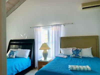Your Family Escape: Relaxing Villa with 2 Bedrooms &Baths, Parking & shared Pool