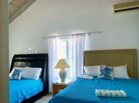 Grace Bay Beachwalk Villa with 2 Bedrooms, Shared Pool and Private Deck