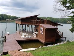Awesome Lake House with Natural Beach, Huge Dock, and Sunset Views. Sleeps 9