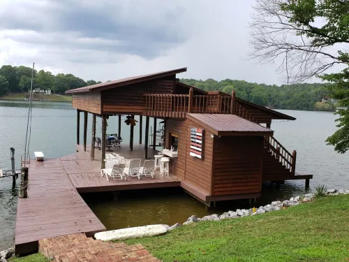 Awesome Lake House with Natural Beach, Huge Dock, and Sunset Views. Sleeps 9