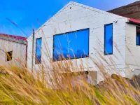 Loft house with incredible views of the fjord Hotels in Grenivík