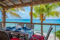 Beachfront Home with Large Deck. Walk to Restaurants.  Near Downtown. Hotels in 