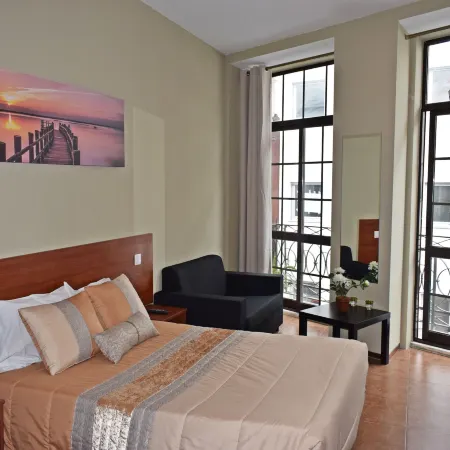 GuestHouse Belo Horizonte Отели рядом с достопримечательностью «Театр Колизей-Порту»