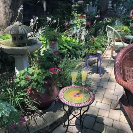 Live in this iconic East Side lower level apartment