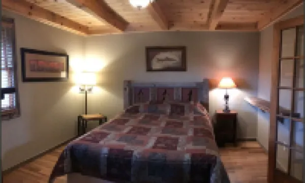 A hand-crafted cabin built in the middle of a Christmas Tree farm.